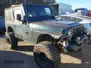 2005 Jeep Wrangler SE z VIN 1J4FA29155P366432, wystawiony jako IAAI lot #41260303 z przebiegiem 134 021 mil mil oraz . Historia ofert i sprzedaży dostępna na DreamBid. Obrazek 1.