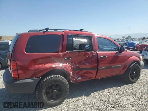 2007 Dodge Durango SXT with VIN 1D8HB38P77F571042, listed as a Copart auction lot 60001335 with 184,045 mi miles and Salvage title. Bid and sale history available at DreamBid. Image 3.