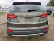 2014 Hyundai Santa Fe с VIN 5XYZU3LA3EG212720, выставлен на аукционе Copart как лот 63099705 с пробегом 137 315 миль миль и Списание • Salvage title. История ставок и продаж доступна на DreamBid. Изображение 6.