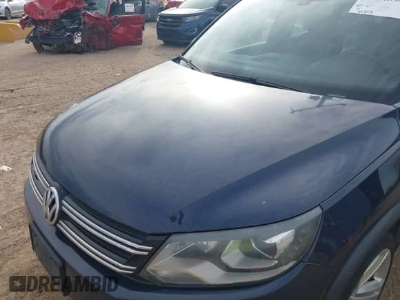 2015 Volkswagen Tiguan S with VIN WVGAV7AX7FW093868, listed as a IAAI auction lot 43143969 with 116,252 mi miles and . Bid and sale history available at DreamBid. Image 6.