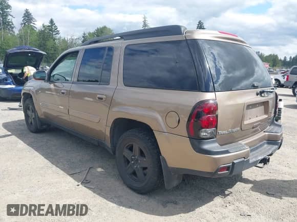 2003 Chevrolet TrailBlazer EXT LT with VIN 1GNET16S936152671, listed as a IAAI auction lot 42299402 with 170,748 mi miles and . Bid and sale history available at DreamBid. Image 3.