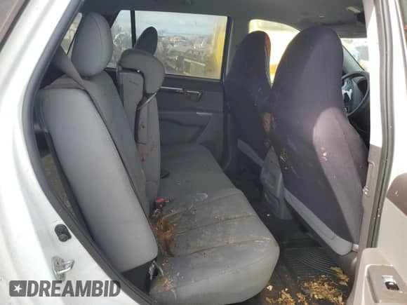 2012 Hyundai Santa Fe GLS z VIN 5XYZG3AB9CG108118, wystawiony jako Copart lot #65477805 z przebiegiem 53 711 mil mil oraz Szkoda całkowita • Salvage title. Historia ofert i sprzedaży dostępna na DreamBid. Obrazek 11.