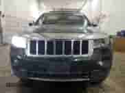 2012 Jeep Grand Cherokee Limited z VIN 1C4RJFBT9CC249950, wystawiony jako Copart lot #68299315 z przebiegiem 218 587 mil mil oraz Szkoda całkowita • Salvage title. Historia ofert i sprzedaży dostępna na DreamBid. Obrazek 5.