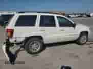 2002 Jeep Grand Cherokee Limited with VIN 1J4GX58N12C282300, listed as a Copart auction lot 74939754 with 166,018 mi miles and Salvage title. Bid and sale history available at DreamBid. Image 3.