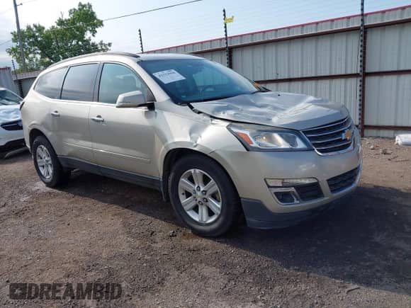 2014 Chevrolet Traverse LT z VIN 1GNKRHKD7EJ169048, wystawiony jako IAAI lot #42332958 z przebiegiem 184 819 mil mil oraz . Historia ofert i sprzedaży dostępna na DreamBid. Obrazek 1.