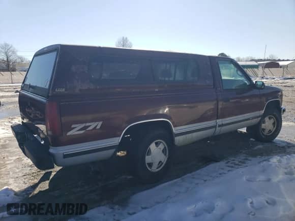 1997 GMC Sierra 1500 z VIN 1GTEK14R3VZ506326, wystawiony jako Copart lot #87036644 z przebiegiem 212 945 mil mil oraz Czysty tytuł • Clean title. Historia ofert i sprzedaży dostępna na DreamBid. Obrazek 3.