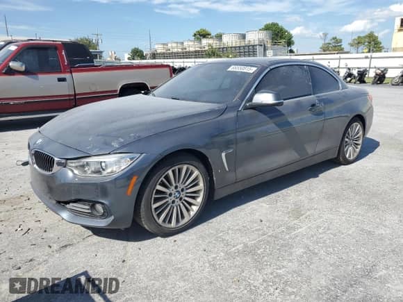 2015 BMW 4 Series 428i with VIN WBA3V7C54FP771900, listed as a Copart auction lot 66550815 with 104,367 mi miles and Salvage title. Bid and sale history available at DreamBid. Image 1.
