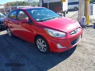 2013 Hyundai Accent GLS z VIN KMHCU4AEXDU279373, wystawiony jako IAAI lot #43498600 z przebiegiem 187 443 mil mil oraz . Historia ofert i sprzedaży dostępna na DreamBid. Obrazek 1.