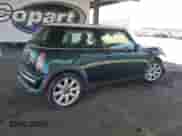 2003 MINI Hardtop with VIN WMWRC33403TE17958, listed as a Copart auction lot 61500055 with 96,476 mi miles and Salvage title. Bid and sale history available at DreamBid. Image 3.