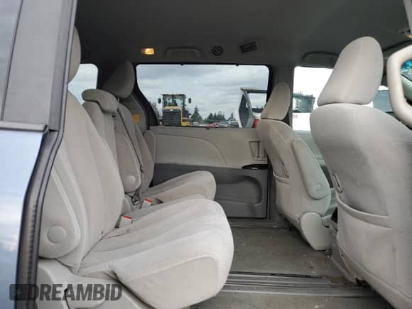 2013 Toyota Sienna LE AAS with VIN 5TDKK3DC5DS395885, listed as a Copart auction lot 82605275 with 216,957 mi miles and Salvage title. Bid and sale history available at DreamBid. Image 11.