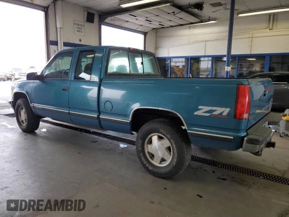 1997 GMC Sierra 1500 с VIN 2GTEK19R1V1555882, выставлен на аукционе Copart как лот 80388325 с пробегом 140 233 миль миль и Списание • Salvage title. История ставок и продаж доступна на DreamBid. Изображение 2.