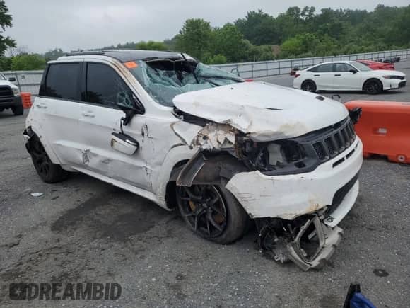 2021 Jeep Grand Cherokee Trackhawk z VIN 1C4RJFN9XMC822632, wystawiony jako Copart lot #63075795 z przebiegiem 12 474 mil mil oraz Szkoda całkowita • Salvage title. Historia ofert i sprzedaży dostępna na DreamBid. Obrazek 4.