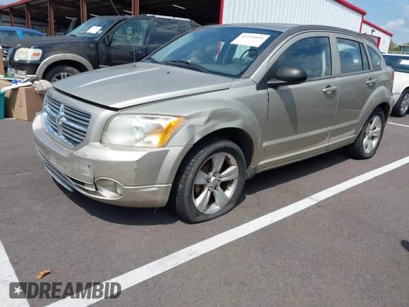 2010 Dodge Caliber Mainstreet with VIN 1B3CB3HA3AD546258, listed as a IAAI auction lot 43193810 with 143,349 mi miles and . Bid and sale history available at DreamBid. Image 2.