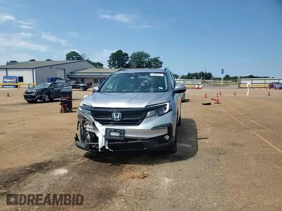 2021 Honda Pilot Special Edition z VIN 5FNYF6H29MB082294, wystawiony jako Copart lot #71696795 z przebiegiem 49 885 mil mil oraz Szkoda całkowita • Salvage title. Historia ofert i sprzedaży dostępna na DreamBid. Obrazek 14.