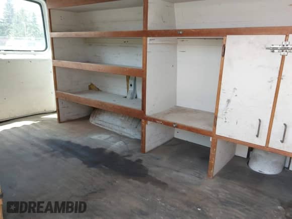 1997 Chevrolet Chevy Van z VIN 1GCHG35J0V1094111, wystawiony jako IAAI lot #42496560 z przebiegiem 164 894 mil mil oraz . Historia ofert i sprzedaży dostępna na DreamBid. Obrazek 8.
