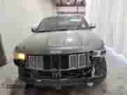 2014 Jeep Grand Cherokee Summit with VIN 1C4RJFJT8EC268672, listed as a Copart auction lot 69583715 with 157,725 mi miles and Clean title. Bid and sale history available at DreamBid. Image 5.