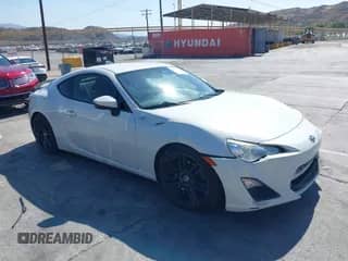 2015 Scion FR-S z VIN JF1ZNAA18F9706133, wystawiony jako IAAI lot #42554875 z przebiegiem 124 183 mil mil oraz . Historia ofert i sprzedaży dostępna na DreamBid. Obrazek 1.