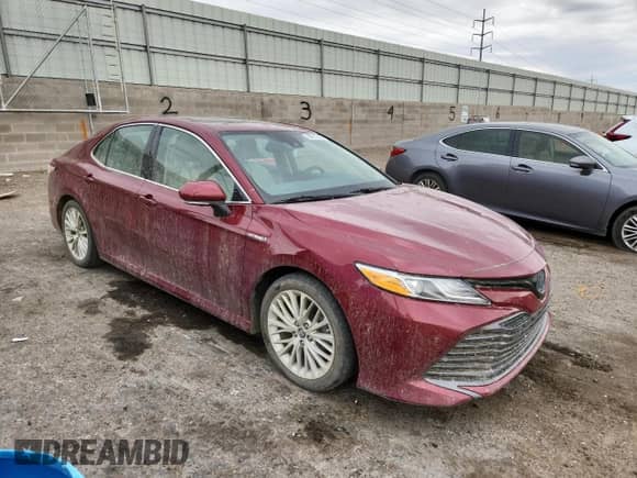 2019 Toyota Camry Hybrid LE с VIN 4T1B21HK0KU013577, выставлен на аукционе Copart как лот 69117375 с пробегом 99 364 миль миль и Списание • Salvage title. История ставок и продаж доступна на DreamBid. Изображение 4.