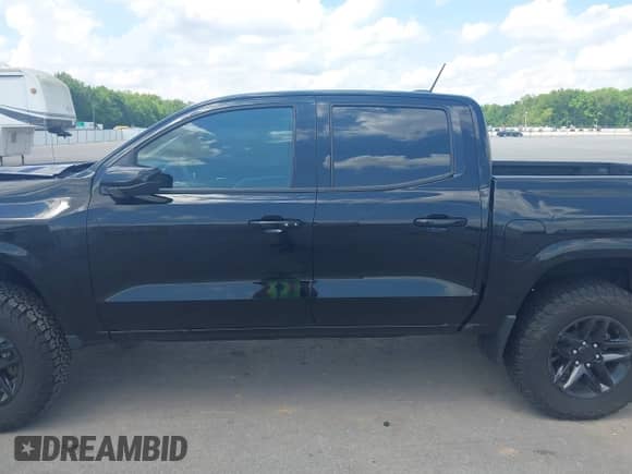 2023 Chevrolet Colorado 4WD Z71 with VIN 1GCPTDEK1P1209999, listed as a IAAI auction lot 42265017 with 13,754 mi miles and . Bid and sale history available at DreamBid. Image 15.