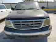 2002 Ford F-150 XL z VIN 1FTRX17282NB99126, wystawiony jako Copart lot #81027325 z przebiegiem 271 648 mil mil oraz Czysty tytuł • Clean title. Historia ofert i sprzedaży dostępna na DreamBid. Obrazek 5.