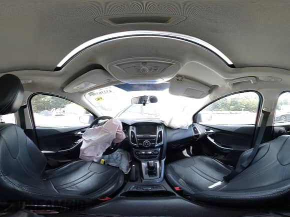 2014 Ford Focus Titanium z VIN 1FADP3N2XEL221125, wystawiony jako IAAI lot #43258398 z przebiegiem 165 585 mil mil oraz . Historia ofert i sprzedaży dostępna na DreamBid. Obrazek 19.