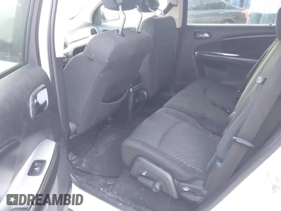 2015 Dodge Journey American Value z VIN 3C4PDCAB8FT605870, wystawiony jako IAAI lot #43035703 z przebiegiem 215 596 mil mil oraz . Historia ofert i sprzedaży dostępna na DreamBid. Obrazek 8.