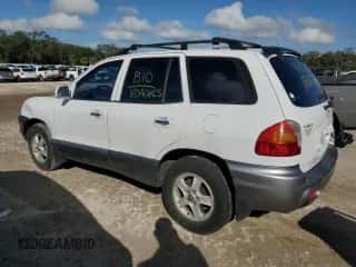 2001 Hyundai Santa Fe GLS с VIN KM8SC83D91U048535, выставлен на аукционе Copart как лот 85041184 с пробегом 218 621 миль миль и Списание • Salvage title. История ставок и продаж доступна на DreamBid. Изображение 2.
