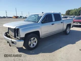 2014 Chevrolet Silverado 1500 LT with VIN 3GCUKREC3EG140209, listed as a Copart auction lot 80690015 with 189,001 mi miles and Salvage title. Bid and sale history available at DreamBid. Image 1.