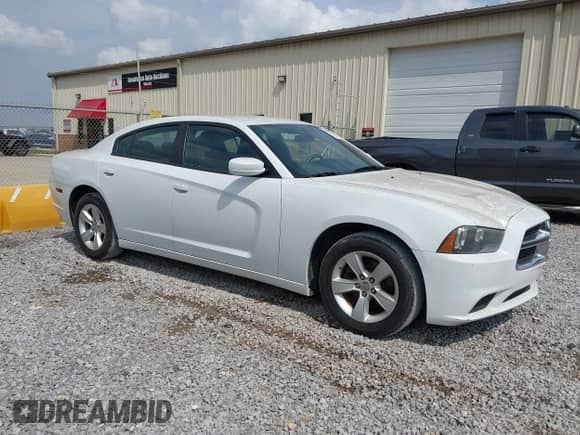 2014 Dodge Charger SE with VIN 2C3CDXBG4EH342546, listed as a IAAI auction lot 43290596 with 176,642 mi miles and . Bid and sale history available at DreamBid. Image 1.