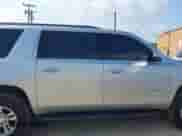 2020 Chevrolet Suburban LT with VIN 1GNSKHKCXLR258283, listed as a IAAI auction lot 42735336 with 178,697 mi miles and . Bid and sale history available at DreamBid. Image 13.