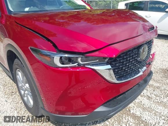 2023 Mazda CX-5 S Carbon Edition z VIN JM3KFBCM4P0239778, wystawiony jako IAAI lot #42856157 z przebiegiem 17 778 mil mil oraz . Historia ofert i sprzedaży dostępna na DreamBid. Obrazek 18.