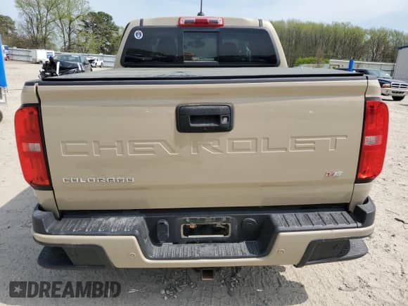 2021 Chevrolet Colorado 4WD Z71 with VIN 1GCGTDEN1M1258691, listed as a Copart auction lot 51511715 with 56,276 mi miles and Salvage title. Bid and sale history available at DreamBid. Image 6.