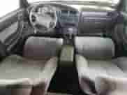 1992 Toyota Camry z VIN JT2VK12E3N0015025, wystawiony jako Copart lot #55521815 z przebiegiem 176 104 mil mil oraz Szkoda całkowita • Salvage title. Historia ofert i sprzedaży dostępna na DreamBid. Obrazek 8.