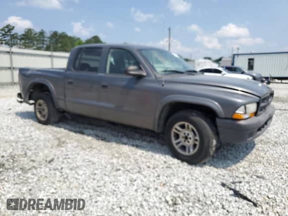 2003 Dodge Dakota Sport with VIN 1D7HL38X33S350007, listed as a Copart auction lot 59471835 with 222,406 mi miles and Salvage title. Bid and sale history available at DreamBid. Image 4.