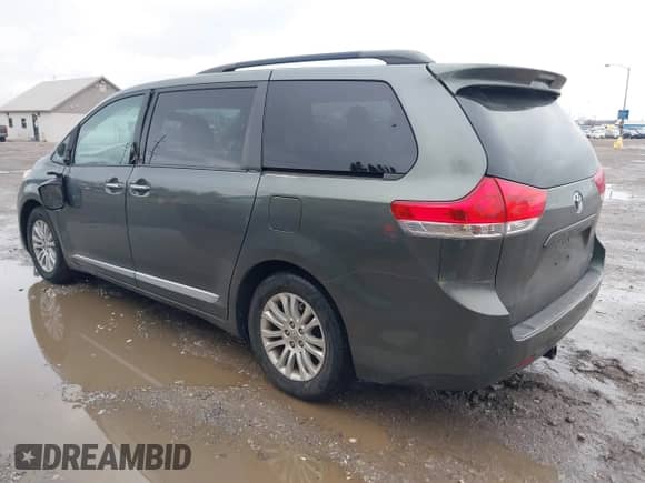 2013 Toyota Sienna XLE AAS with VIN 5TDYK3DC8DS375852, listed as a IAAI auction lot 41519437 with 91,828 mi miles and . Bid and sale history available at DreamBid. Image 3.