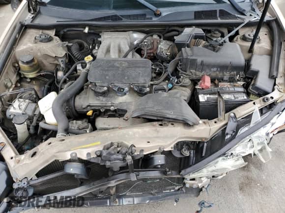2002 Toyota Camry XLE с VIN 4T1BF32K12U034317, выставлен на аукционе Copart как лот 71867425 с пробегом Не указан миль и Списание • Salvage title. История ставок и продаж доступна на DreamBid. Изображение 11.