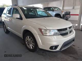 2013 Dodge Journey SXT with VIN 3C4PDCBG5DT588808, listed as a IAAI auction lot 43446932 with 152,278 mi miles and . Bid and sale history available at DreamBid. Image 1.