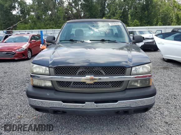 2004 Chevrolet Silverado 1500 Work Truck z VIN 1GCEC14X44Z307070, wystawiony jako Copart lot #62503865 z przebiegiem 131 697 mil mil oraz Szkoda całkowita • Salvage title. Historia ofert i sprzedaży dostępna na DreamBid. Obrazek 5.