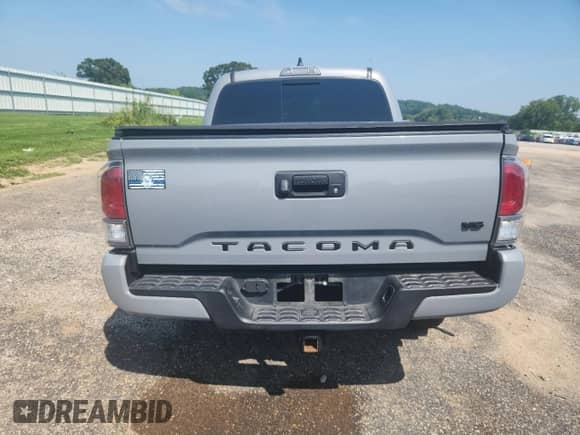 2020 Toyota Tacoma SR5 z VIN 3TMCZ5AN3LM365185, wystawiony jako Copart lot #65887715 z przebiegiem 123 533 mil mil oraz Szkoda całkowita • Salvage title. Historia ofert i sprzedaży dostępna na DreamBid. Obrazek 6.