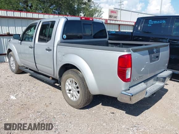 2015 Nissan Frontier SV with VIN 1N6AD0ER9FN703119, listed as a IAAI auction lot 43126137 with 181,958 mi miles and . Bid and sale history available at DreamBid. Image 3.