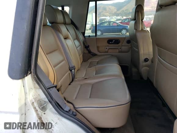 2000 Land Rover Discovery Cloth with VIN SALTY1543YA273374, listed as a Copart auction lot 86026964 with 115,114 mi miles and Clean title. Bid and sale history available at DreamBid. Image 11.