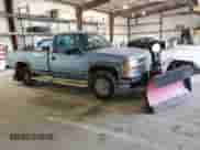 1996 Chevrolet Silverado 2500 с VIN 1GCGK24R1TZ130527, выставлен на аукционе Copart как лот 67178235 с пробегом 212 037 миль миль и Списание • Salvage title. История ставок и продаж доступна на DreamBid. Изображение 4.