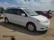 2009 Toyota Sienna XLE с VIN 5TDZK22C29S278249, выставлен на аукционе Copart как лот 65256245 с пробегом 160 884 миль миль и Списание • Salvage title. История ставок и продаж доступна на DreamBid. Изображение 4.
