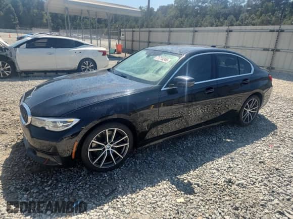 2021 BMW 3 Series 330i with VIN 3MW5R1J0XM8B51761, listed as a Copart auction lot 71713245 with 140,659 mi miles and Salvage title. Bid and sale history available at DreamBid. Image 1.