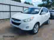 2012 Hyundai Tucson GLS with VIN KM8JU3AC1CU518372, listed as a IAAI auction lot 43323058 with 130,824 mi miles and . Bid and sale history available at DreamBid. Image 2.