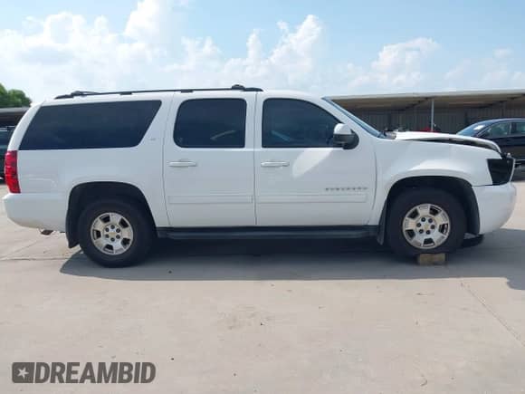 2012 Chevrolet Suburban LT z VIN 1GNSCJE03CR272306, wystawiony jako IAAI lot #43038425 z przebiegiem 193 430 mil mil oraz . Historia ofert i sprzedaży dostępna na DreamBid. Obrazek 14.