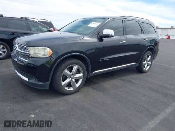 2012 Dodge Durango Citadel with VIN 1C4SDHET9CC229729, listed as a IAAI auction lot 41893819 with 167,519 mi miles and . Bid and sale history available at DreamBid. Image 2.