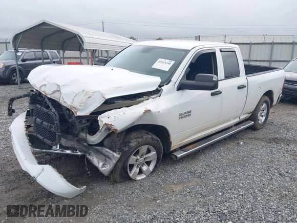 2015 Ram 1500 Tradesman with VIN 1C6RR6FG8FS734961, listed as a IAAI auction lot 42925248 with 216,787 mi miles and . Bid and sale history available at DreamBid. Image 2.