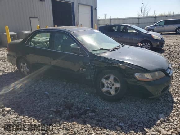 1999 Honda Accord EX with VIN 1HGCG1654XA012935, listed as a Copart auction lot 84449635 with 205,773 mi miles and Non repairable. Bid and sale history available at DreamBid. Image 4.
