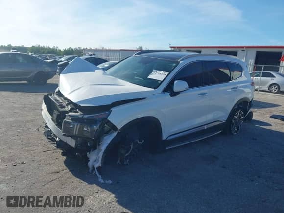 2021 Hyundai Santa Fe Limited with VIN KM8S5DA10MU002978, listed as a IAAI auction lot 42788474 with Not provided miles and . Bid and sale history available at DreamBid. Image 2.